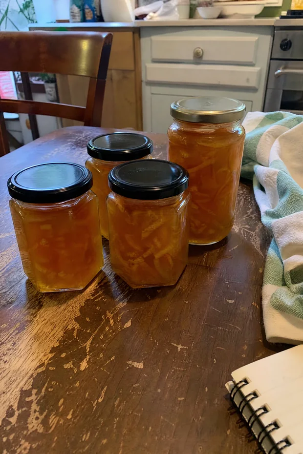 Homemade marmalade on a kitchen table